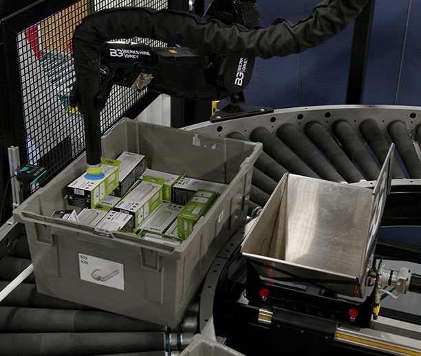 Berkshire Grey sortation shuttle is always ready to receive a SKU for placement in a designated bin