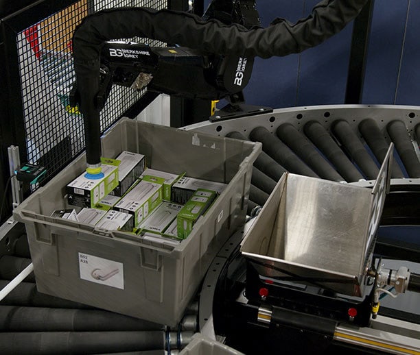 Berkshire Grey sortation shuttle is always ready to receive a SKU for placement in a designated bin