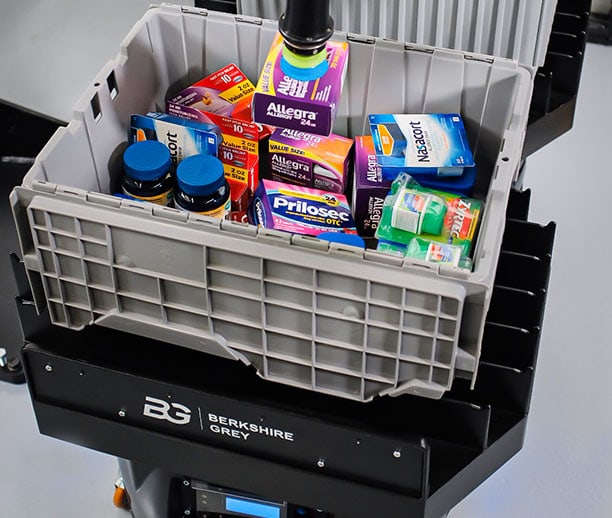 A Berkshire Grey FLEXbot transports a tote to a goods-to-robot sortation station.