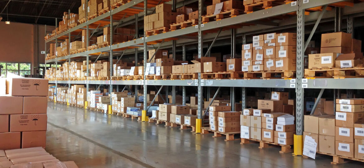 Pallets of goods stacked in warehouse storage