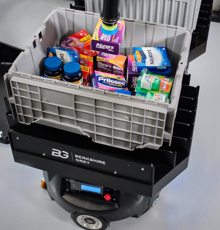 Berkshire Grey intelligent robotic solutions work together to fulfill a drug store order.