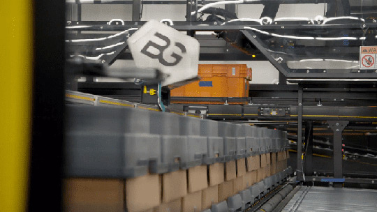 Berkshire Grey sortation shuttle is always ready to receive a SKU for placement in a designated bin